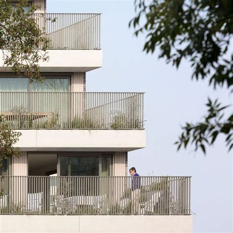 Nl Architects Cloaks Canal Side Amsterdam Residences In A Veil Of Vegetation Facade