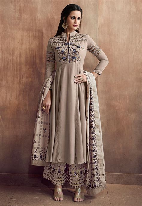 Muslin Cotton Pakistani Suit Light Fawn This Semi Stitched Attire Is Highlighted With Resham
