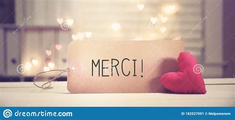 Merci Thank You In French Language With A Red Heart Stock Image