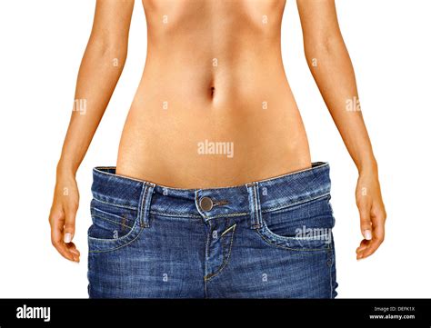 Woman Shows Her Weight Loss By Wearing A Jeans Isolated Stock Photo Alamy