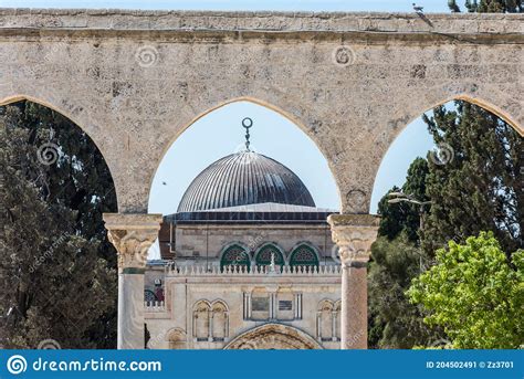 Arched South Gateway With Siliver Dome Of Al Aqsa Mosque At The Square