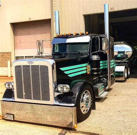 A Very Cool Looking Peterbilt Truck With That Awesome Long Hood And