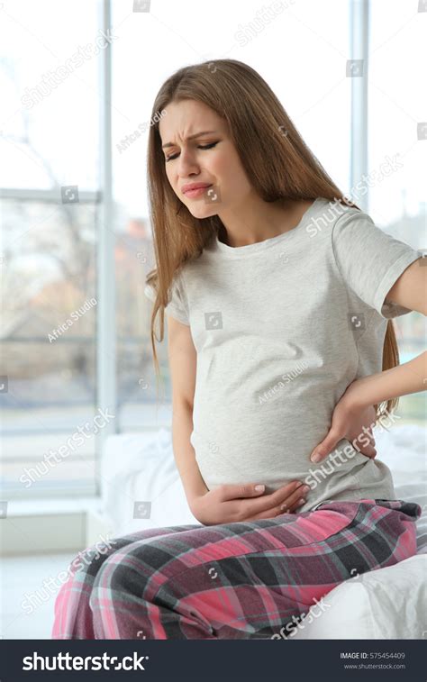Young Pregnant Woman Suffering Abdominal Pain Stock Photo 575454409