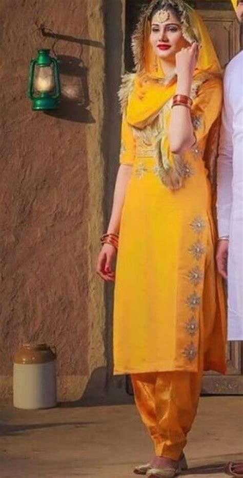 Yellow Traditional Punjabi Salwar Suit Made In Hand Embroidery Work