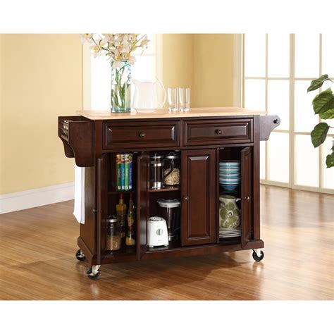 Additionally featuring metal accents for farmhouse flair, this versatile furniture piece can double as a kitchen island, bar cart, or dining buffet to make it both sensible and luxurious. Crosley Kitchen Cart/Island by OJ Commerce $369.00 - $460.00
