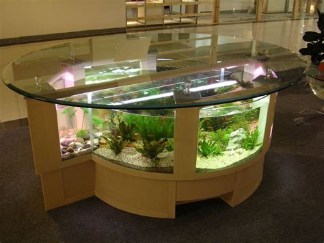 Only 1 available and it's in 1 person's cart. Shaped Coffee Table Fish Tank