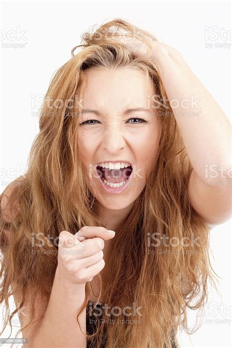 Frustrated Girl Screaming Pointing With Index Finger Stock Photo
