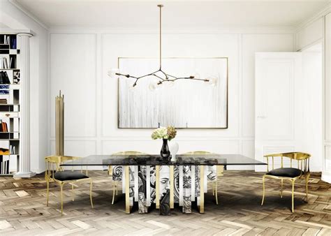A Dining Room Table With Chairs And A Chandelier