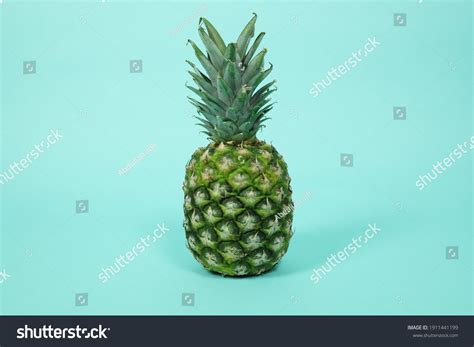 Single Whole Pineapple Isolated On Background Stock Photo 1911441199
