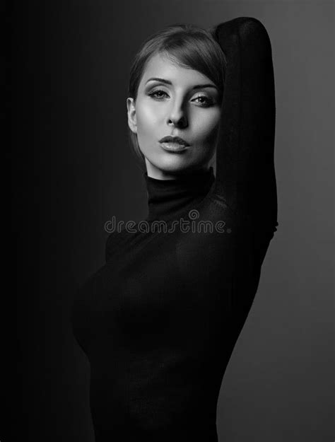 Beautiful Woman With Elegant Neck In Fashion Black Clothing Looking