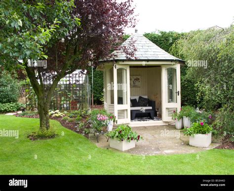 Summer House In A Small Garden Stock Photo Alamy