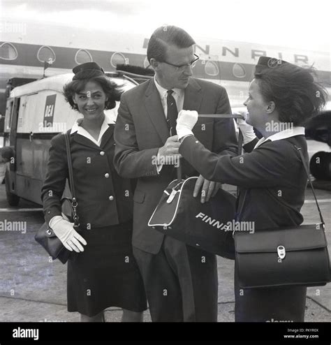 1960s Historical A Gentleman Flying With Finlands National Airline