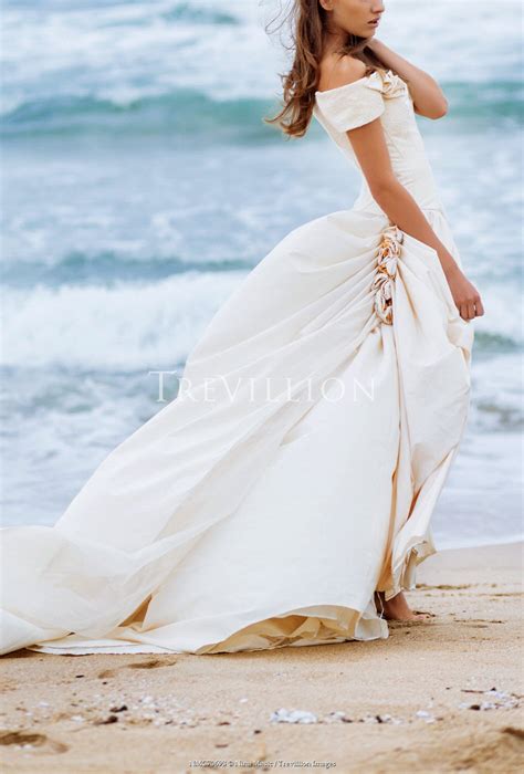 Trevillion Images Nina Masic Woman In Wedding Dress On Beach Pe8