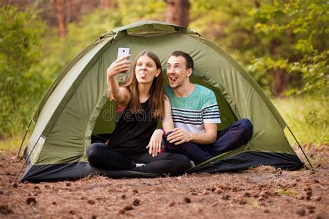 Camping Couple In Tent Taking Selfie Happy Friends Having Fun Togheter Stock Image Image Of