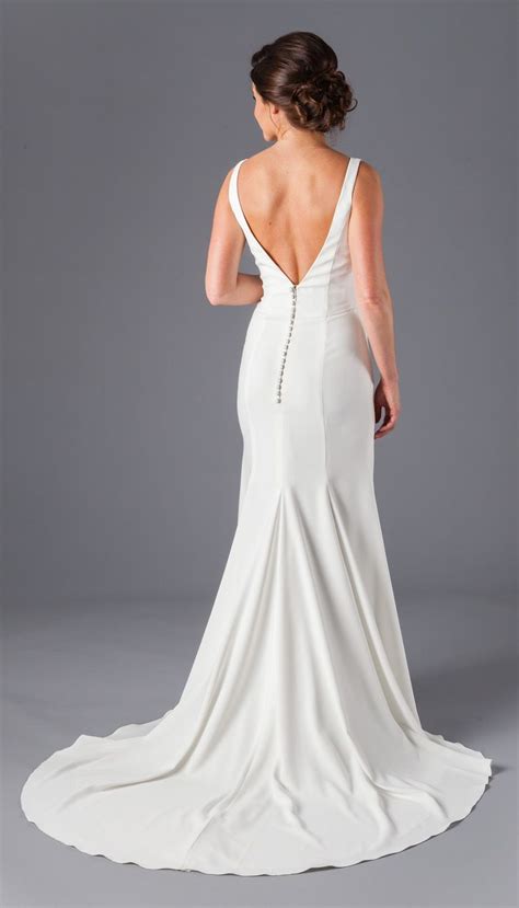 Made Of A Lightweight Crepe Fabric This Simple Wedding Dress Features
