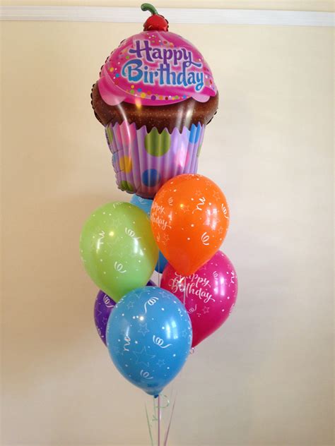 Happy birthday candle letters on a cake with. The Balloon Shop - Happy Birthday Cupcake Balloon Bouquet