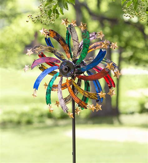Multi Colored Metal Wind Spinner With Stars And Solar Lights Wind And