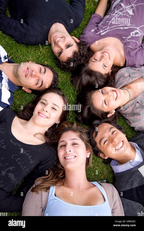 Happy Group Of Friends Together On The Floor Outdoors Stock Photo Alamy