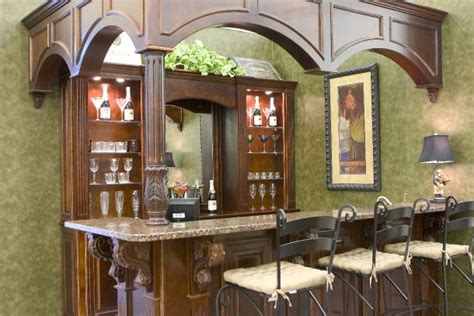 We built these cabinets to accommodate the angles of this kitchen making great use of otherwise unusable space. Custom Cabinets- Georgia on Your Lot Builders