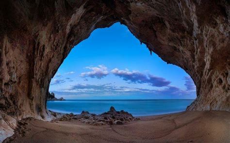 Landscape Nature Beach Cave Sand Rock Sea Clouds Blue Morning