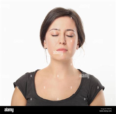 Young Elegant Woman Relaxing With Closing Eyes Stock Photo Alamy