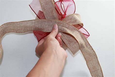 Shorten the long ends with scissors. embroitique.com: How to Make Big Decorative Bows ~ a ...
