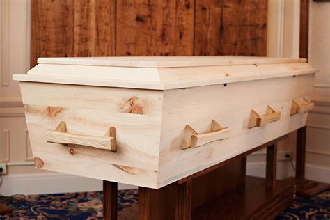 old world in plain pine — northwoods casket company casket wood casket interior sliding barn