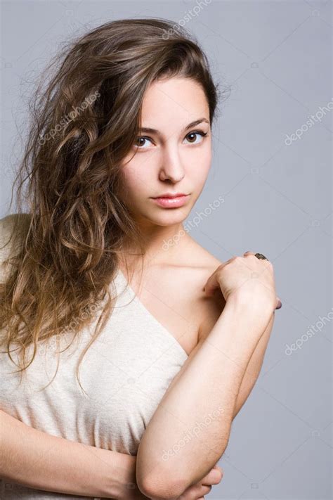 Dreamy Young Brunette Beauty Stock Photo By ©envivo 10906350