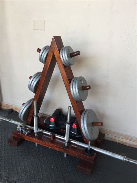 Please include details on the build. DIY home gym wood weights rack | Diy home gym, Home gym garage, Gym setup