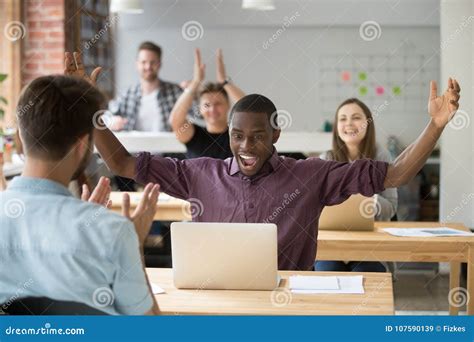 African Employee Excited About Online Win Coworking Team Congra Stock Image Image Of Happy