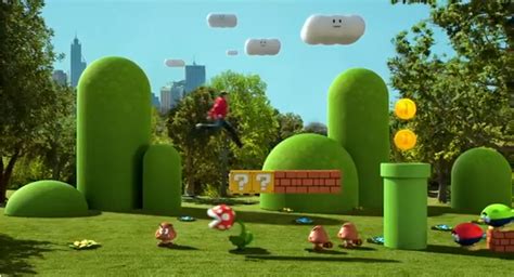 The Nintendo Wii Game Is Being Played In An Open Field With Mario And