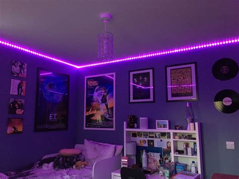 fun and groovy room with led lights and posters 80s theme room 80s room decor theme room