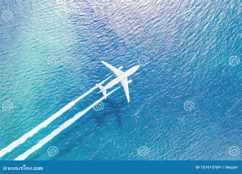 Airplane Flying Over Ocean