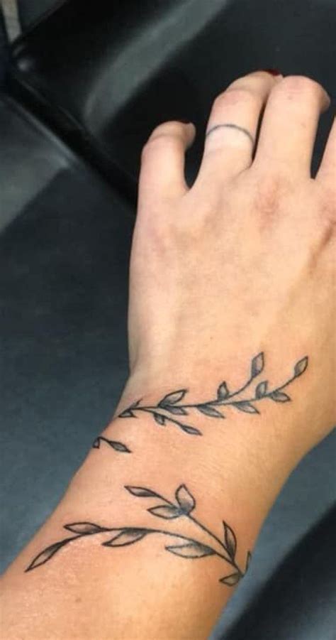 vines and rings wrap around wrist tattoos around arm tattoo wrap tattoo