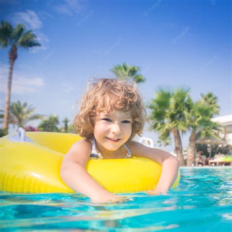 Premium Photo Portrait Of Happy Kid Posing Outdoor