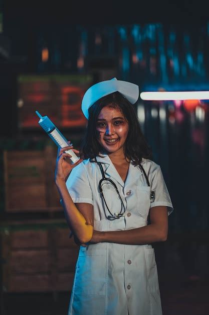 premium photo horror scary evil insane nurse doctor held the knife zombie woman gosth with