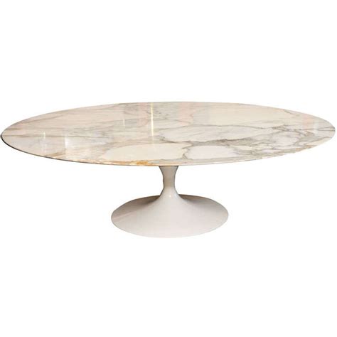 Oval coffee table with marble top. Early Saarinen Oval Tulip Coffee Table Calacatta D'Oro ...
