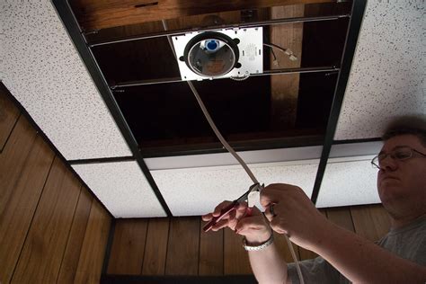 Remove the ceiling tile at each recessed light location. DIY Recessed Lighting Installation in a Drop Ceiling ...