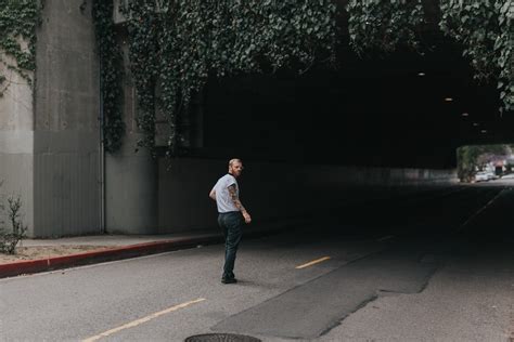 Man Walking Through The Tunnel Photo Free Los Angeles Image On Unsplash