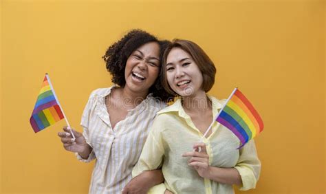 Couple Of Same Sex Marriage From Difference Races With The Lgbtq Rainbow Flag For Pride Month