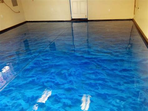 Then we painted the floor. Ocean blue Metallic Epoxy floor installed with SpartaFlex ...