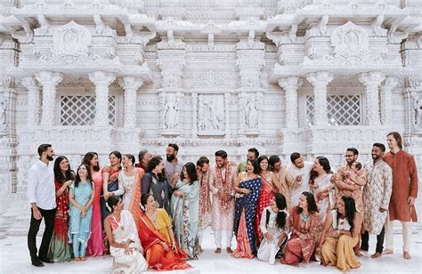 gay indian couple holds a traditional wedding ceremony in a hindu temple and their photos go