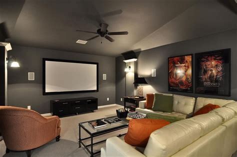 I Like The Gray Walls In This Media Room With The Pop Of Orange For