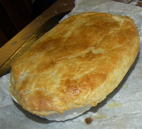 Pour this into the dutch oven along with the chicken stock, tomato paste, quartered onion, carrots, celery, garlic, thyme, and bay leaf. Alton Brown's Individual Chicken Pot Pie with Puff Pastry ...