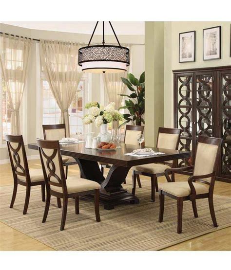 This outdoor dining table set includes one rectangular table and eight dining chairs. Teak Wood 6 Seater Dining Table Set in Black - Buy Teak ...