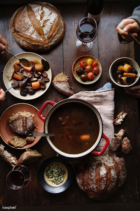 Maybe you would like to learn more about one of these? Download premium image of Dinner table with a beef stew ...