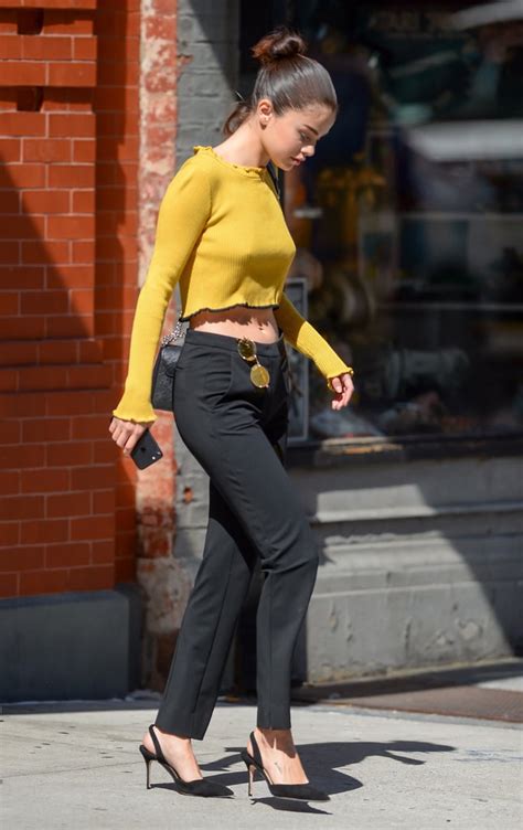 Selena Gomez Wearing Yellow Crop Top Popsugar Fashion