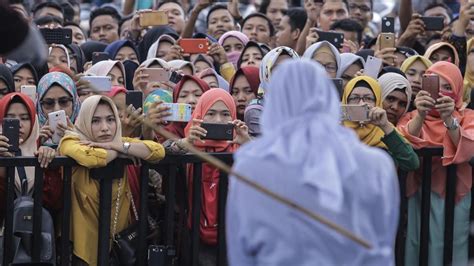 In Indonesia Couples Caned In Front Of Crowd For Public Shows Of