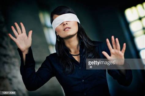 blindfold tied photos and premium high res pictures getty images