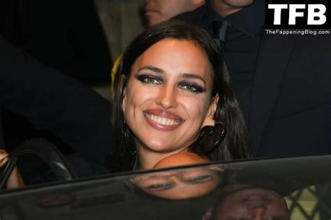 irina shayk shows off her sexy legs as she arrives to versace after party during milan fashion